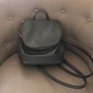 Grey backpack purse